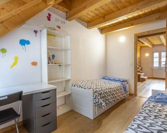 Halte Rothe Haus Tarvisio Charming Flat - Tarvisio - Camera da letto