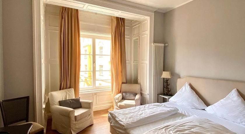 Bedroom view of Das Nikolai Hotel