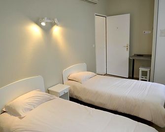 Hôtel Les Arceaux - Saint-Sever - Habitación