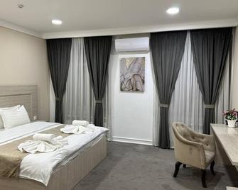 South Hotel Tashkent - Taškent - Ložnice