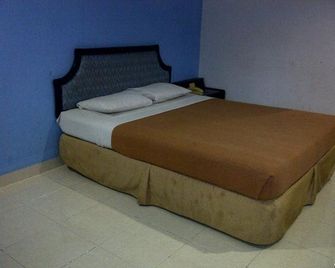 Amans Inn - Ambon - Habitación