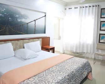 NatureMark Gallery and Guest House - Uyo - Bedroom