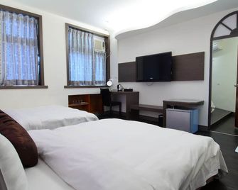 Yuh-Tarng Hotel - Magong City - חדר שינה