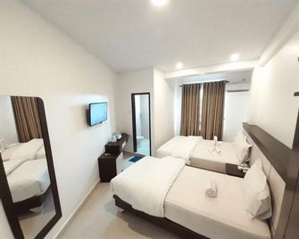 Mita Mulia Hotel By Calandra - Banda Aceh - Bedroom