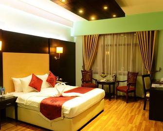 Juffair Gate Hotel - Manama - Schlafzimmer