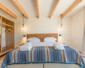 Sleep & Nature Hotel - Lavre - Camera da letto