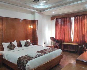 Hotel Ambarish Grand Residency - Guwahati - Bedroom