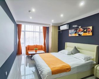Nuolin Boutique Cinema Apartment (Wuyue Plaza Branch) - Tangshan - Chambre