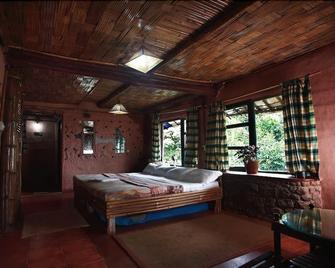 Wild Elephant Eco-Friendly Resort - Munnar - Phòng ngủ