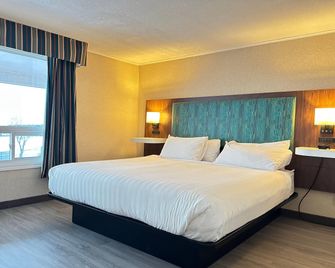 Travelodge by Wyndham Amherst - Amherst - Schlafzimmer