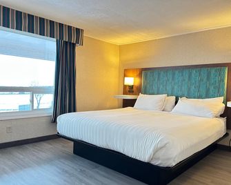 Travelodge by Wyndham Amherst - Amherst - Ložnice