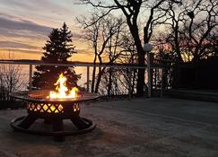 Cozy warm fireplace and relaxing hot tub on Big Detroit for the holiday season! - Detroit Lakes - Outdoors view