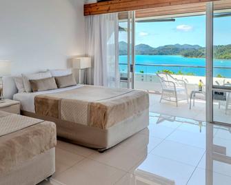 Bella Vista E9 - Ocean View Spacious 2 Bedroom with golf buggy - Hamilton Island - Bedroom