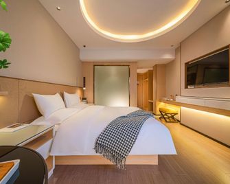 Yeste Hotel Liuzhou Wuxing Pedestrian Street Longtan Park - Liuzhou - Bedroom