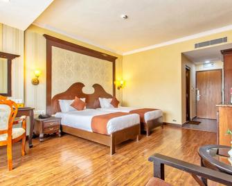 Hotel Da Yatra - פוחארה - חדר שינה