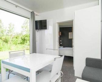Strand49 holiday house by the sea - Sint Maartensbrug - Comedor