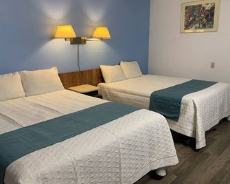 Swiss Sunset Inn - פנטיקטון - חדר שינה