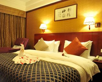 Kunming Zhong Huang Hotel - Kunming - Habitación