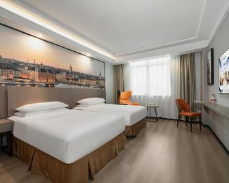 Vienna Hotel Huizhou West Lake Maidi South Road - Huizhou - Спальня