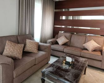 Dara apartment hotel - Amman - Living room