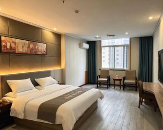 Danya Hotel (Zhenjiang Danyang Wuyue Plaza) - Zhenjiang - Bedroom