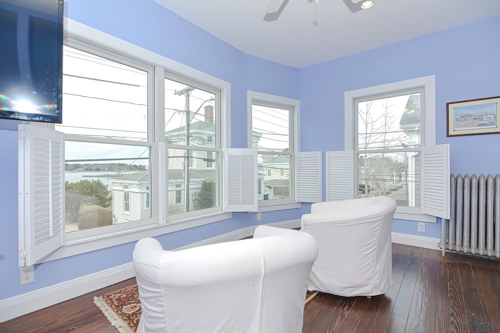 Living room view of Stonington Borough with Water Views
