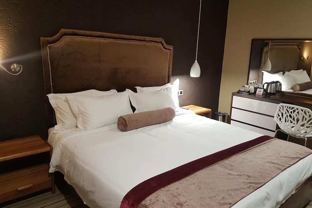 La Signature Guest House - Francistown - Schlafzimmer