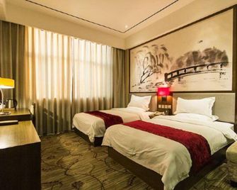 Wujia Yizhan Boutique Inn - Zhengzhou - Habitación