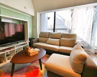 Saiei Hotel Itabashi-Ikebukuro Area - Tokyo - Living room
