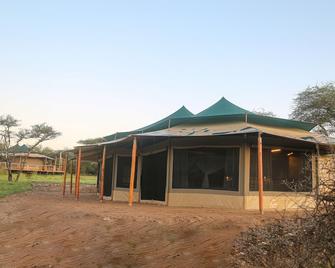 Explore Mara Camp - Ololaimutiek - Building