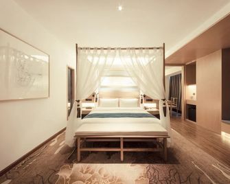 Qianna Qianxun Hotel - Luoyang - Bedroom