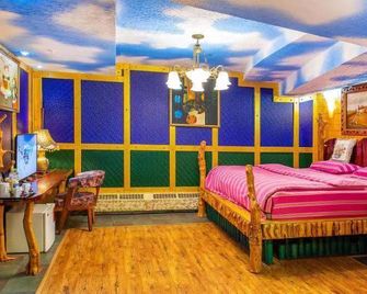 Qingdao Huake Holiday Hotel - تشينغداو - غرفة نوم