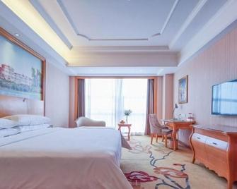 Vienna International Hotel Jiujiang Shili Street - Jiujiang - Sypialnia