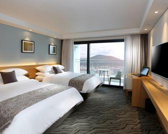 Seogwipo JS Hotel - Seogwipo - Bedroom