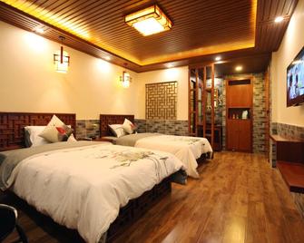 Putuo Memory Boutique Inn - Zhoushan - Schlafzimmer