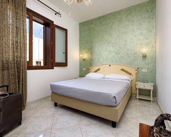 Araba Fenice Hotel - סן ויטו לו קאפו - חדר שינה