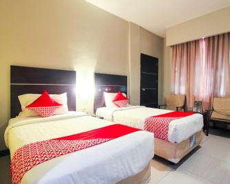 OYO 1729 I-Shine Hotel - Pekanbaru - Habitación