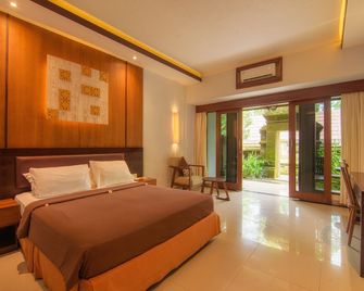 Champlung Sari Hotel and Spa Ubud - Ubud - Bedroom