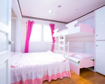 Nanu Guesthouse - סיאול - חדר שינה