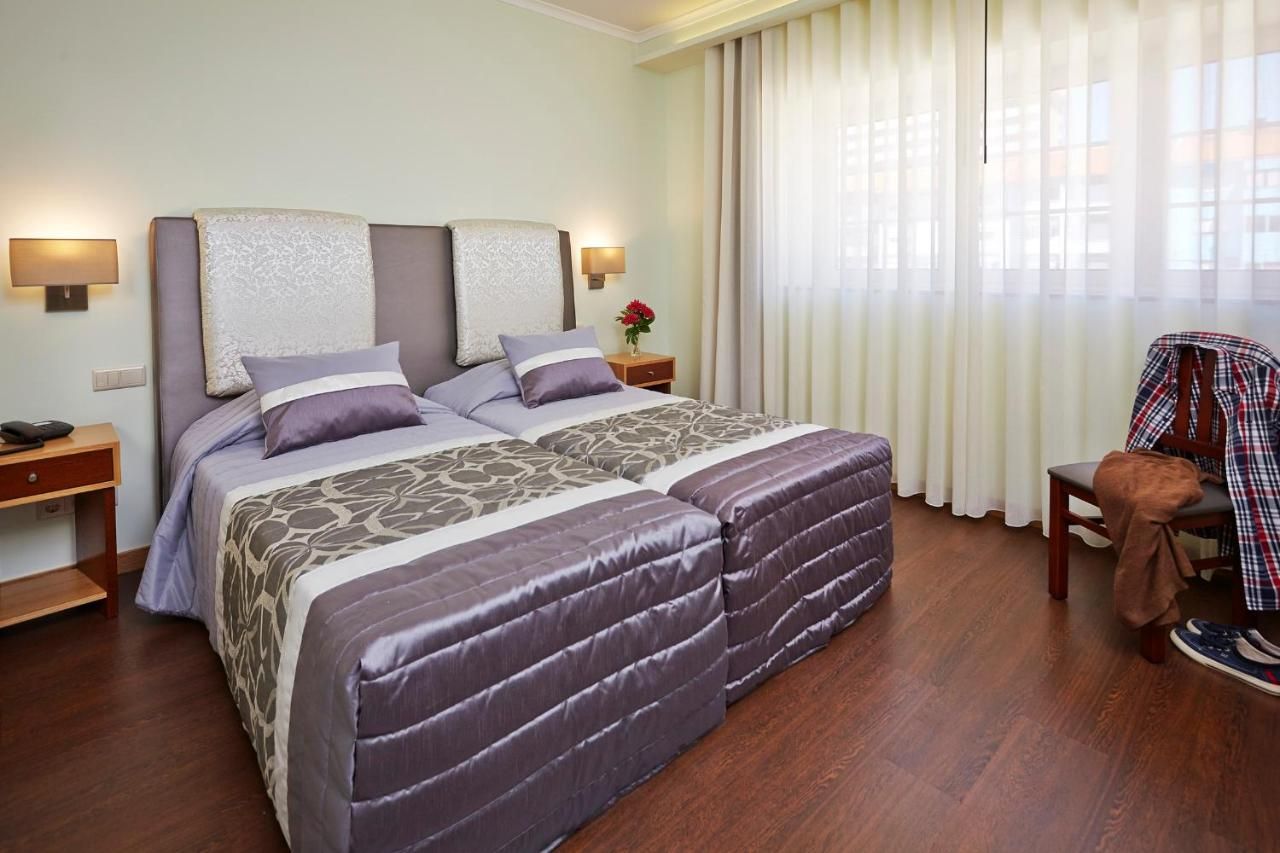 Welcome In - Suites & Hostel - Aveiro - Bedroom