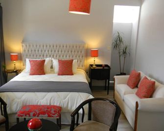 Primera Hacienda Hotel Boutique - לה סרנה - חדר שינה