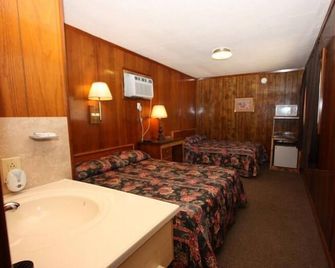 Comfort Green Motel - Thayer - Bedroom