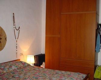 Appartamenti Le Primule - Golfo Aranci - Camera da letto