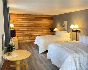 Moose Creek Lodge & Suites - Cody - Bedroom
