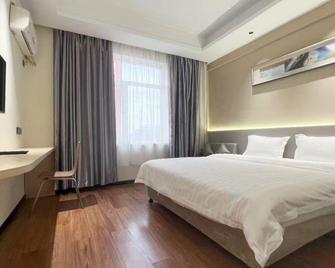Longsheng Huacheng Business Hotel - Anshan - Slaapkamer