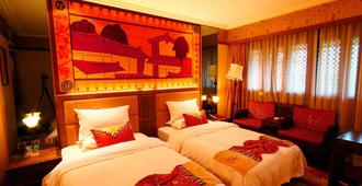 Lijiang Golden Path Hospitality - Lijiang - Bedroom