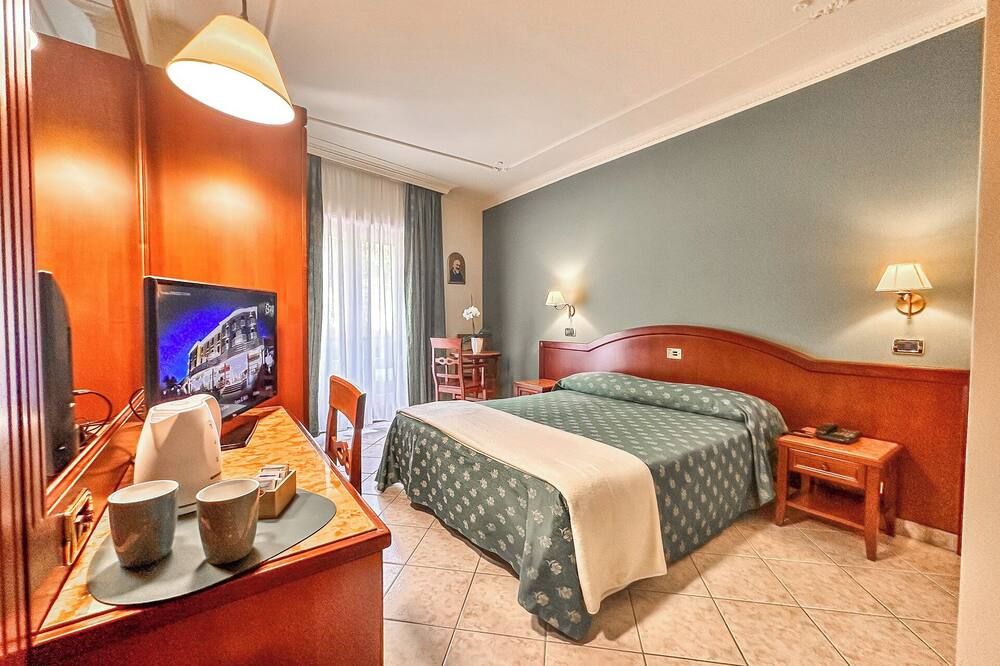 Hotel Valle Rossa - סן ג'ובאני רוטונדו - חדר שינה