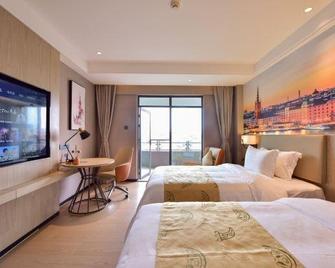 Jingnian Hotel - Jiangmen - Bedroom