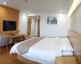 Greentree Inn Anqing Qianshan County Sunshine City Express Hotel - Anqing - Slaapkamer