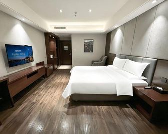 Xinda Hotel - Jincheng - Bedroom